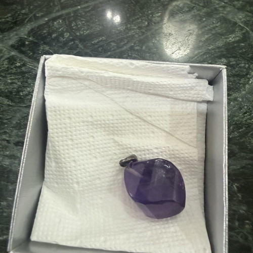 Amethyst pendant with silver bail