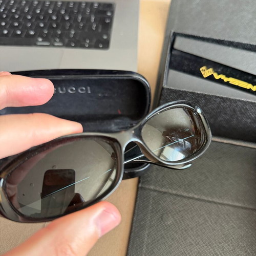 Prada and Gucci sunglasses set used