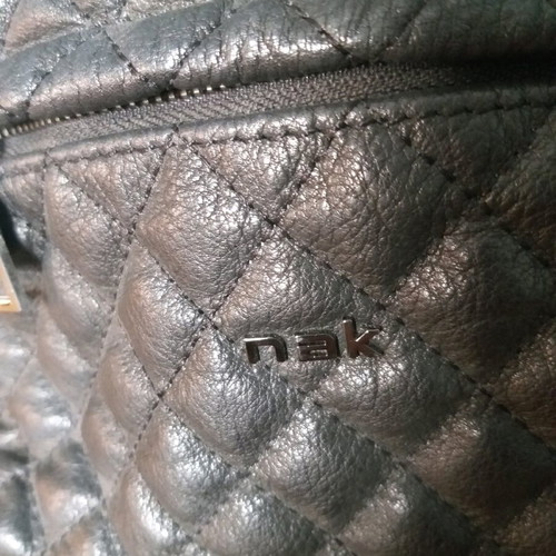 Nak leather quilted packpack like new, black