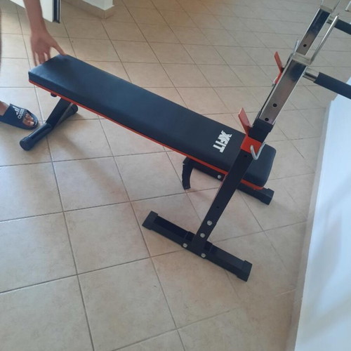 X-FIT gym bench like new with barbell stands