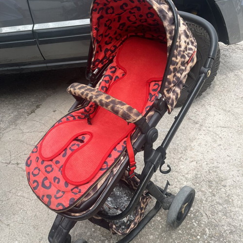 Cossato Leopard Stroller used with bassinet and accessories