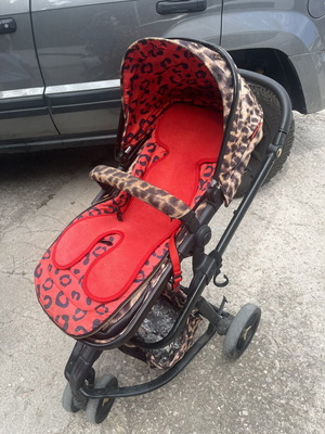 Cossato Leopard Stroller used with bassinet and accessories