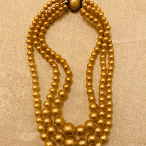 Vintage necklace with 3 rows of pearls used with unique clasp