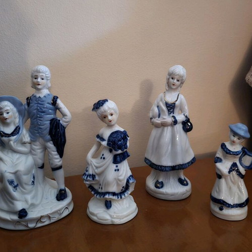 Porcelain decorative figures like new, set of four
