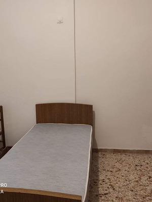 Bed for one person used, without mattress