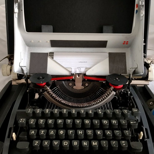 Olympia Traveller 1971 used typewriter with Greek and English keyboard