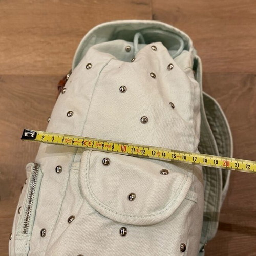 Pink backpack used, fabric turquoise with studs
