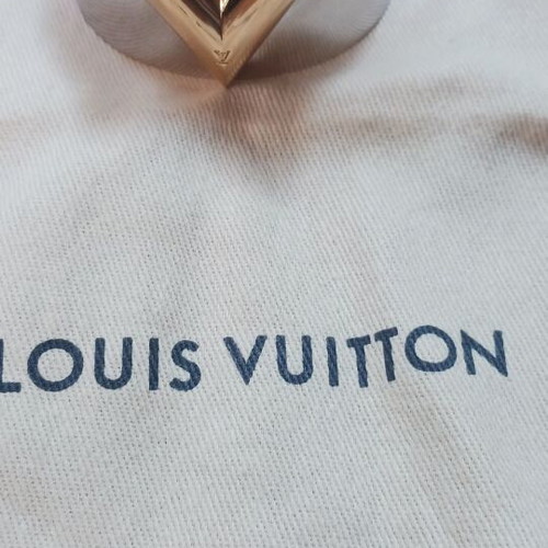Louis Vuitton metal bracelet like new, gold and silver
