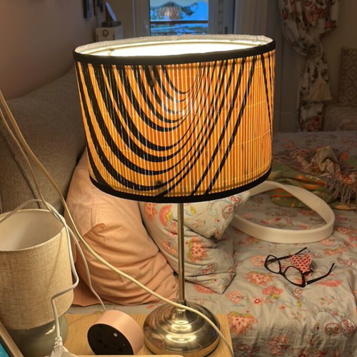 Modern table lamp with black and white geometric shade, optical art
