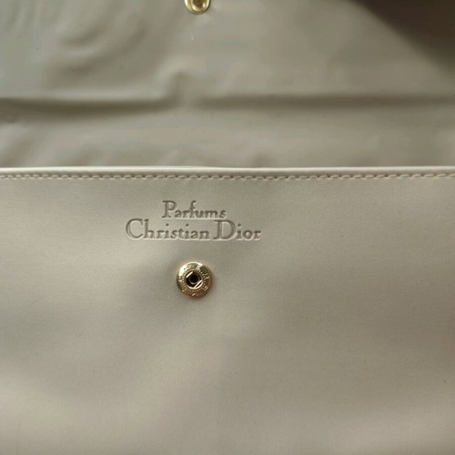 Christian Dior toiletry bag used, beige with iridescent decorations