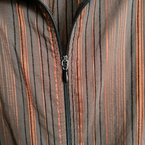 Striped brown and orange Unique shirt used, size L