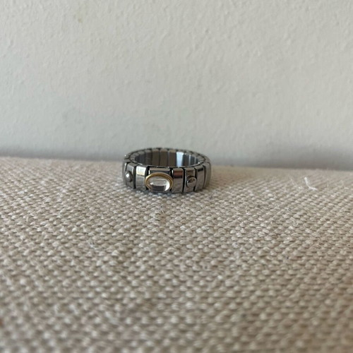 Stainless steel ring with gold detail and clear stone like new