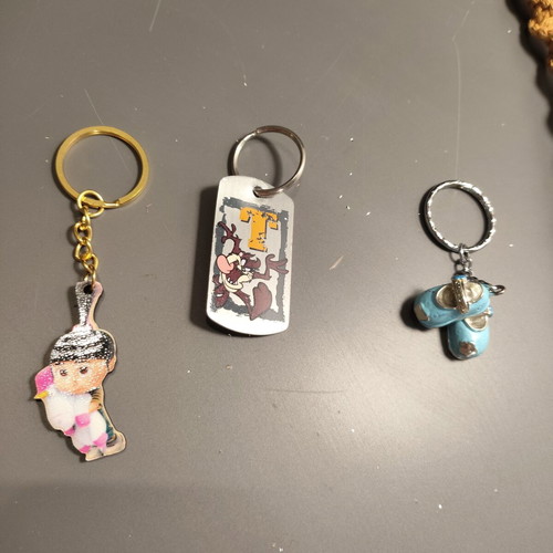 Set of 3 keychains: Agnes Despicable Me, Taz Looney Tunes, blue baby shoes
