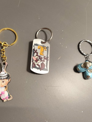 Set of 3 keychains: Agnes Despicable Me, Taz Looney Tunes, blue baby shoes