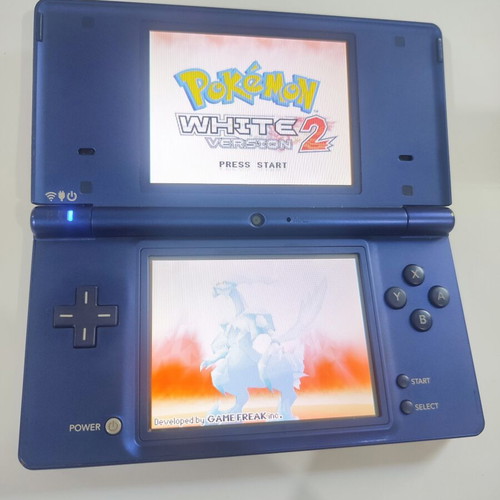 Nintendo DSi handheld console with Pokemon HeartGold game
