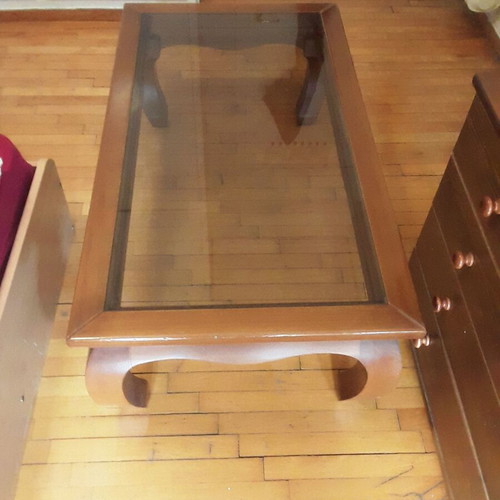 Solid wood coffee table with glass