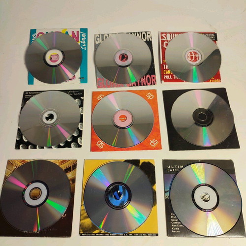 9 music CDs like new, pack with paper case and cover