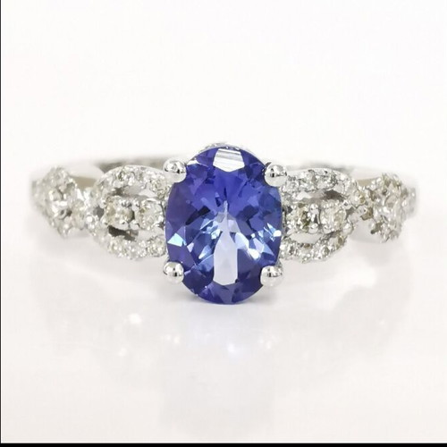 Tanzanite and diamond ring in 14 ct white gold, new