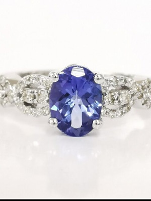 Tanzanite and diamond ring in 14 ct white gold, new