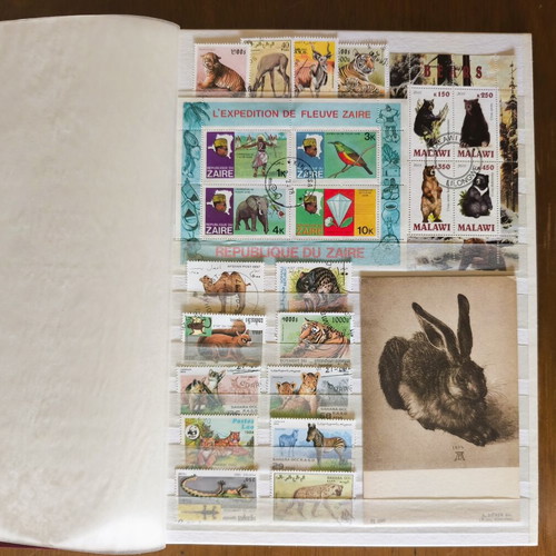 A4 Album 16 Pages with Rich Animal Stamp Collection like new