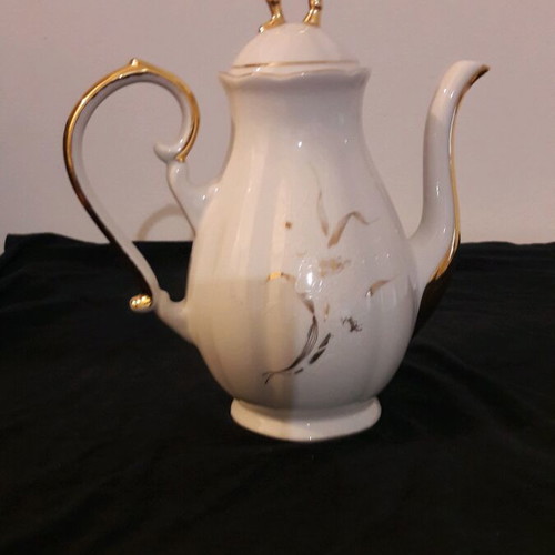 Vintage porcelain teapot and sugar bowl set like new
