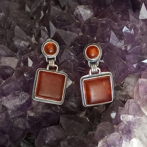 Silver 925 earrings used with natural orange amber