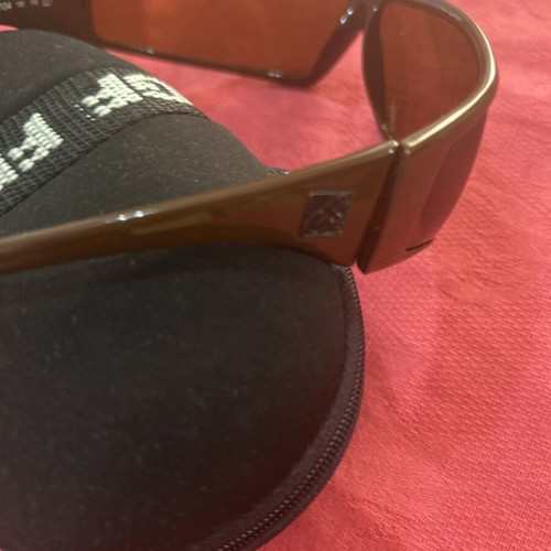 Vintage Gianfranco Ferré sunglasses with brown shield lenses, used