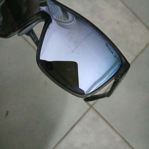 Sunglasses Reebok and Hawkers used, one sports mask with scratches