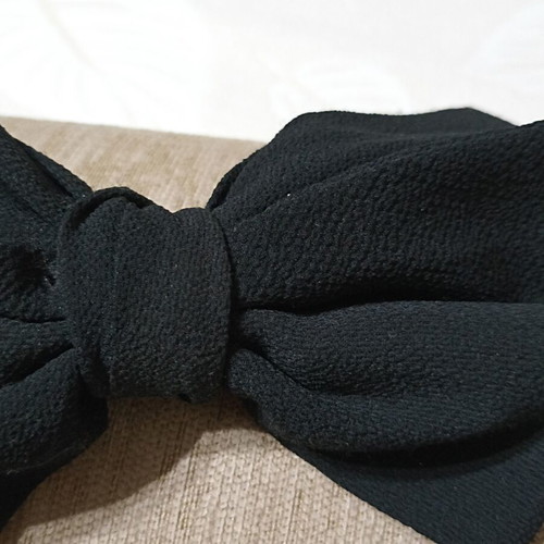 Women's bow hair clip like new, black