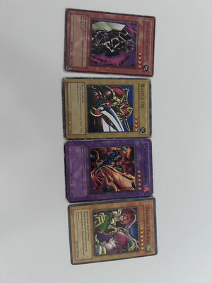 Yu-Gi-Oh! cards set with Flaming Swordsman, Battle Ox, Gearfried the Iron Knight, Three Sisters of Miss Harpy