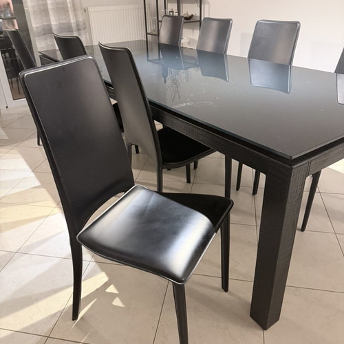 Dining set Casa di Patsi with black glass and 8 leather chairs like new