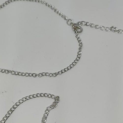 Silver necklace with infinity and cross symbols like new