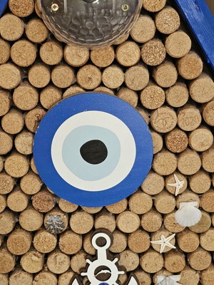 Sea-themed wall art with 600 corks and lighting