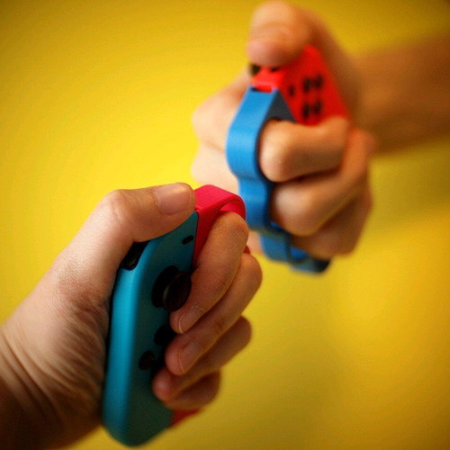 Nintendo Switch joycon finger grips new, blue and red
