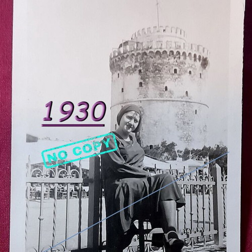 Vintage photo of woman in front of White Tower Thessaloniki 1930