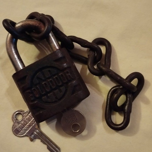 Padlock used with key, chain and skeleton key