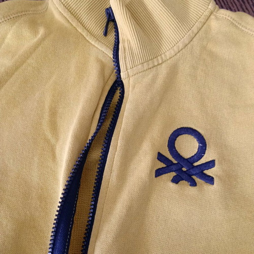 Benetton yellow jacket for 10 years like new