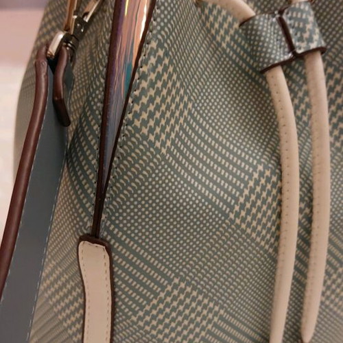 Axel women's pouch bag like new with blue shades