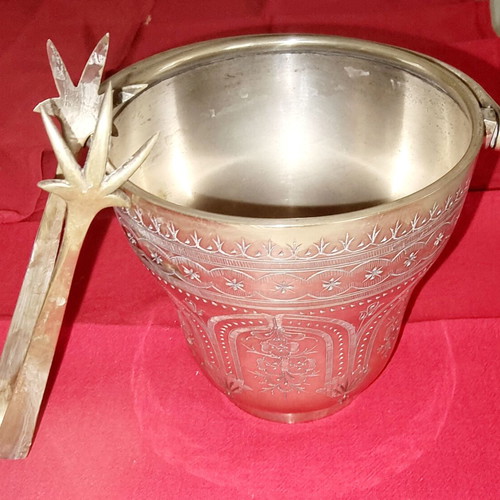 Silver-plated ice bucket like new with carved details and special handle