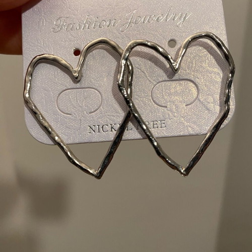 Silver heart-shaped hoop earrings like new