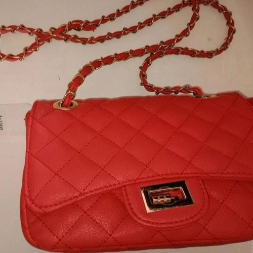 Red small crossbody bag like new with gold details