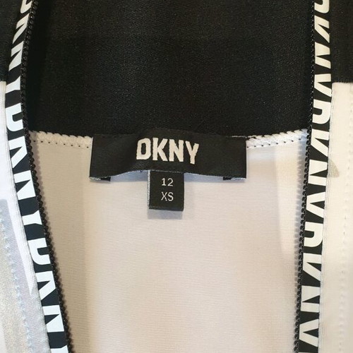 DKNY sleeveless top and skirt set like new, white with silver and black details