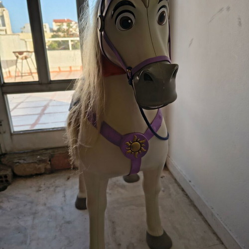 Jakks Pacific Maximus rocking horse toy with sounds used, colorful