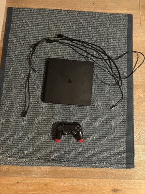 PlayStation 4 console with controller, disc reading issue