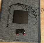 PlayStation 4 console with controller, disc reading issue
