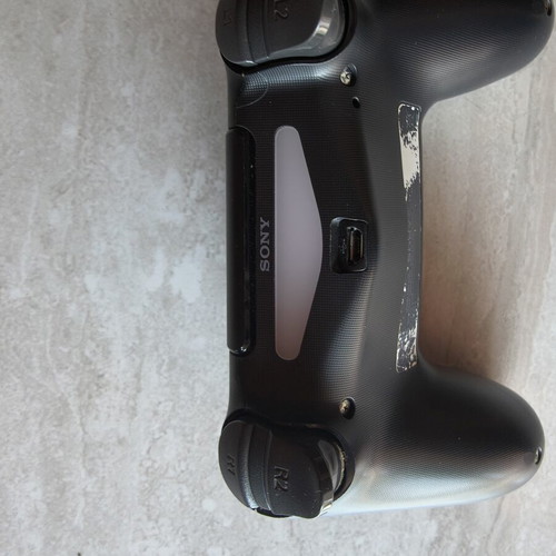PS4 Slim 1TB console used with 3 games and 1 controller