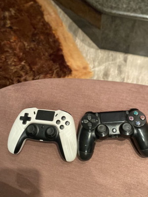 PlayStation 4 (PS4) controllers like new, two pieces