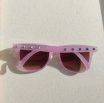 Purple sunglasses used with case