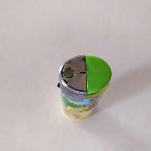 Giraffe lighter like new, plastic with window
