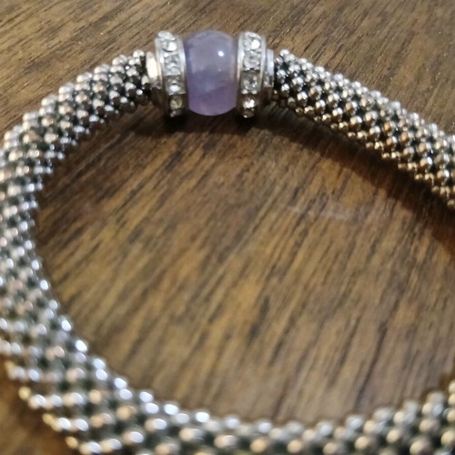Women's bracelet with purple stone and white gems like new